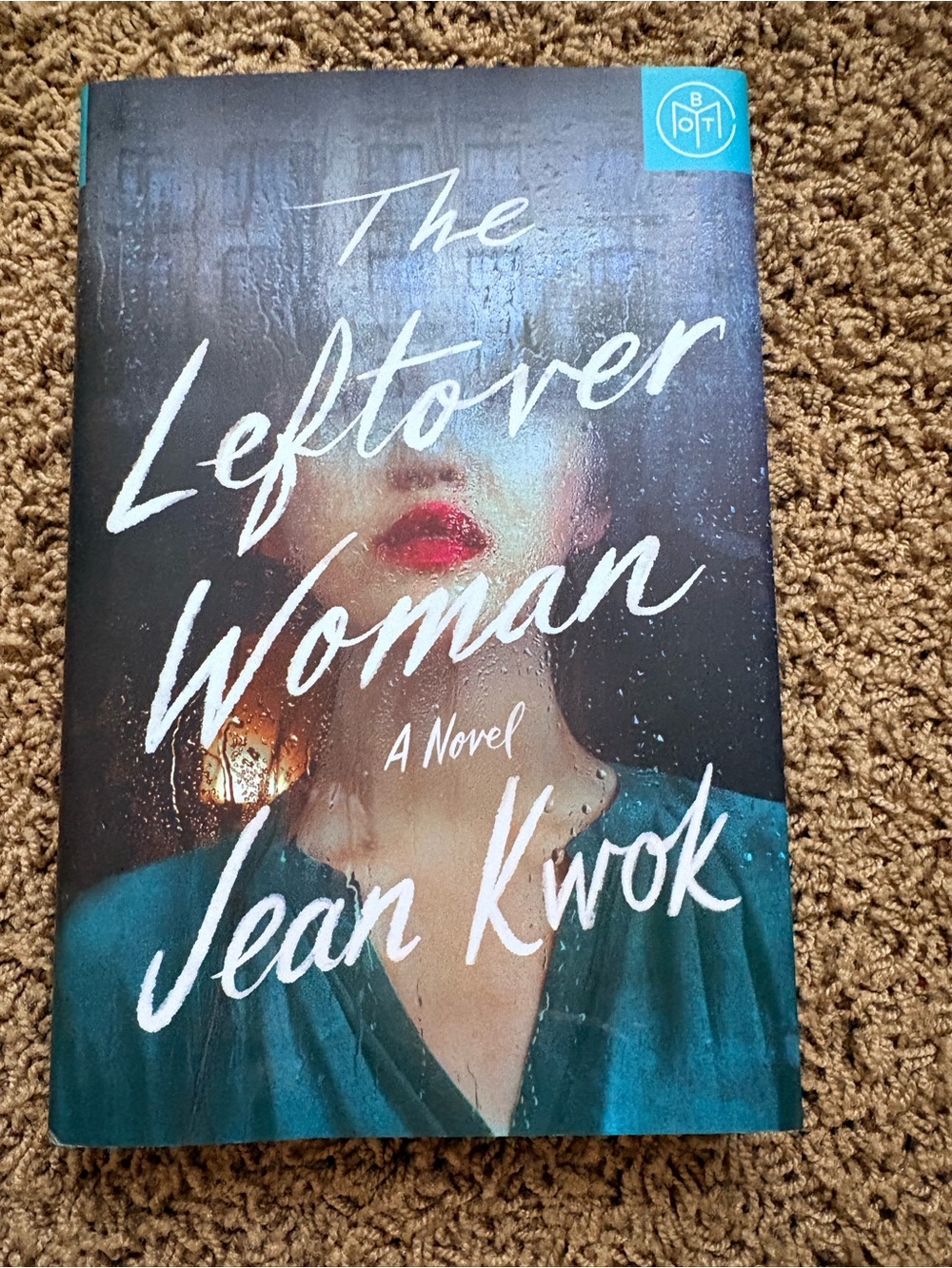The Leftover Woman by Jean Kwok - Teal Hardcover Novel